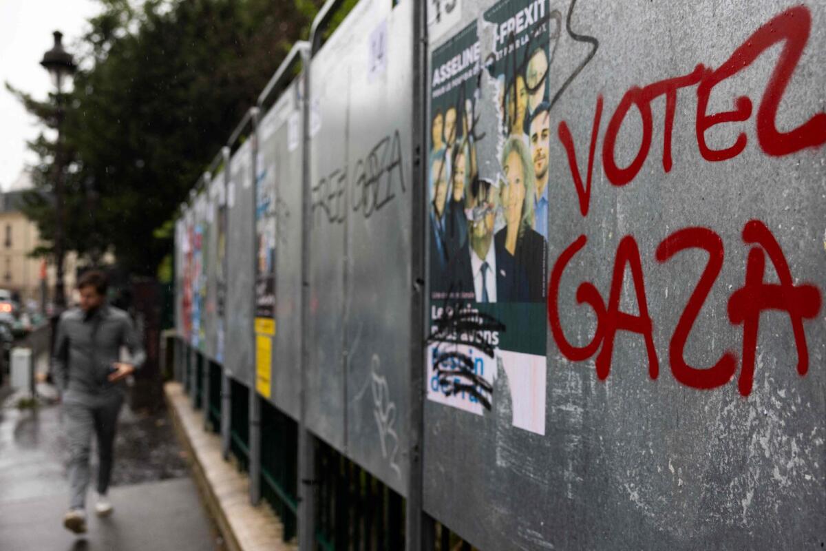 A slogan which reads 'Vote Gaza' is seen on a billboard designated for electoral posters of the upcoming European elections in Paris on June 1, 2024. Photo: AFP