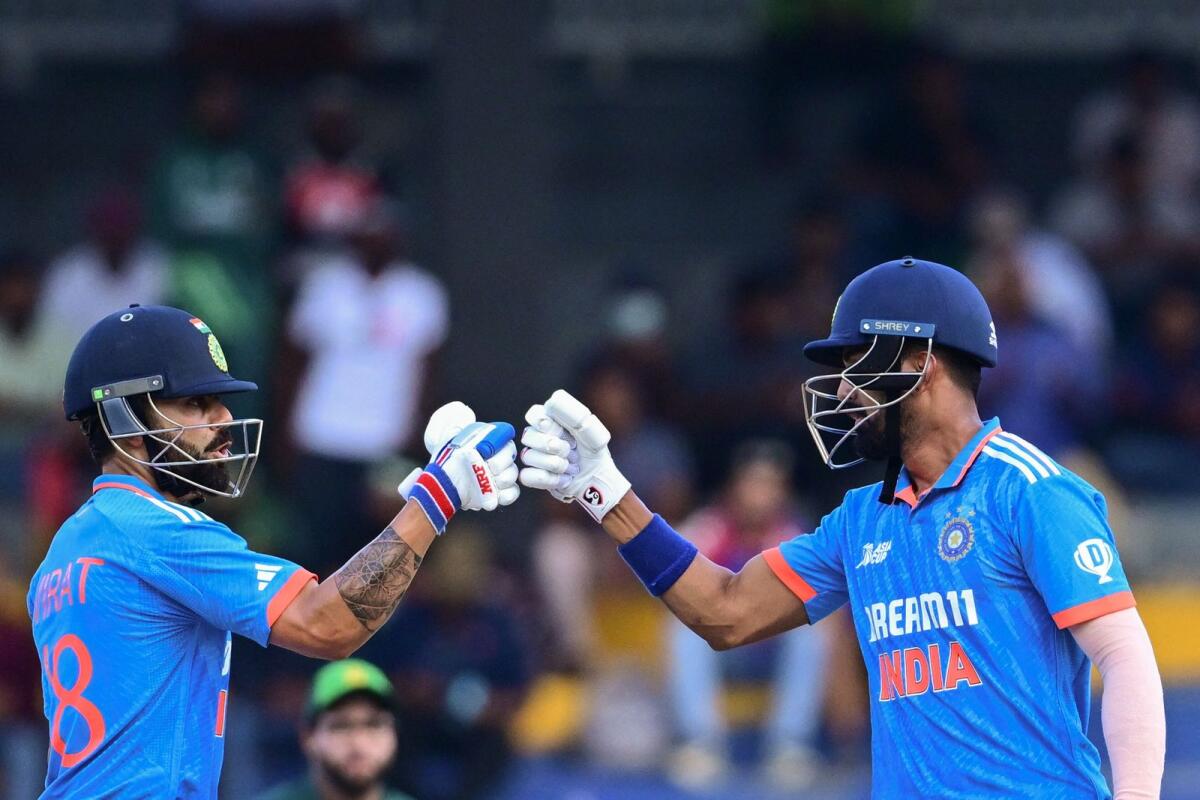 India's Virat Kohli (L) and KL Rahul bump their fists during the Asia Cup 2023 super four one-day international (ODI) cricket match between India and Pakistan. Photo: AFP