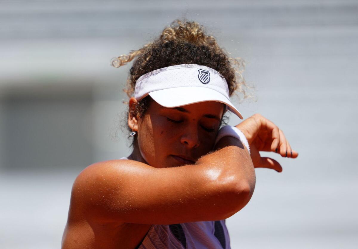 Egypt's Mayar Sherif reacts during her first round defeat to Vondrousova. - AFP