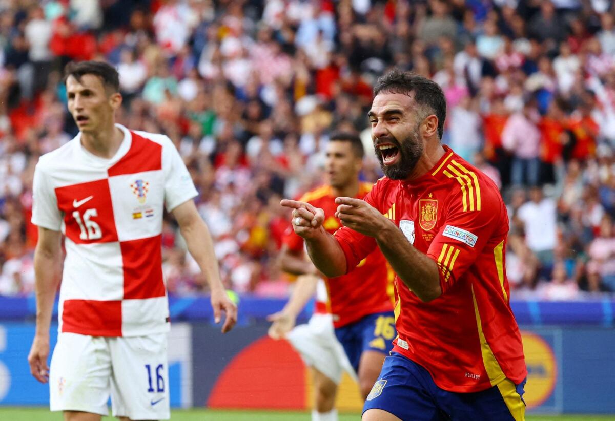 Soccer Football - Euro 2024 - Group B - Spain v Croatia - Berlin Olympiastadion, Berlin, Germany - June 15, 2024Spain's Dani Carvajal celebrates scoring their third goal REUTERS/Fabrizio Bensch     TPX IMAGES OF THE DAY