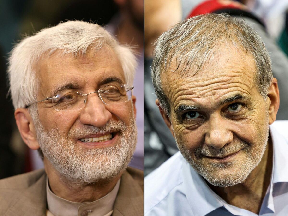 Presidential candidate and ultraconservative former nuclear negotiator Saeed Jalili (L) and Massoud Pezeshkian, reformist candidate in the Iranian election. — AFP file