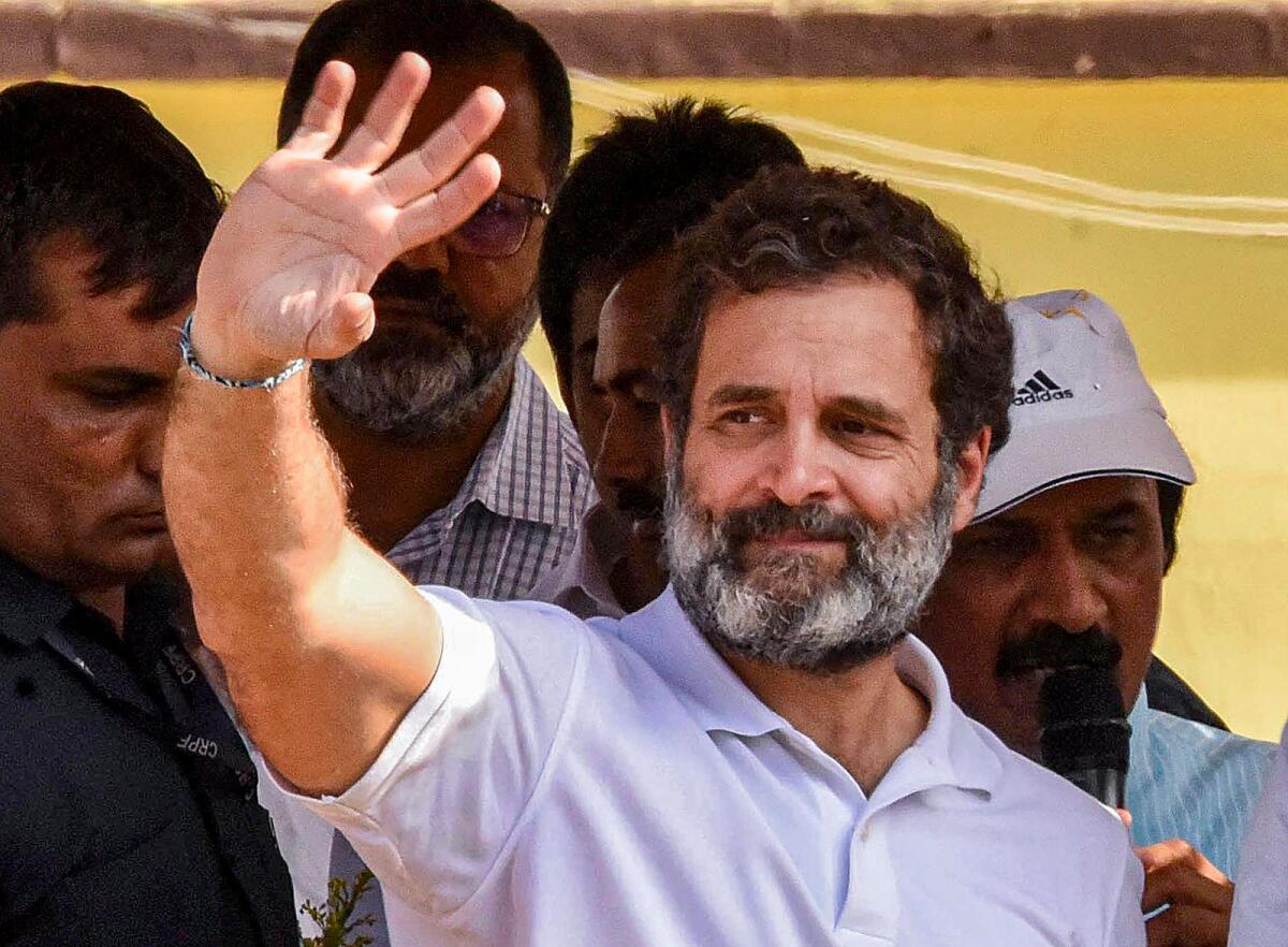 Congress leader Rahul Gandhi waves at supporters during a roadshow ahead of Assembly election sin Chikmagalur on Tuesday. — PTI