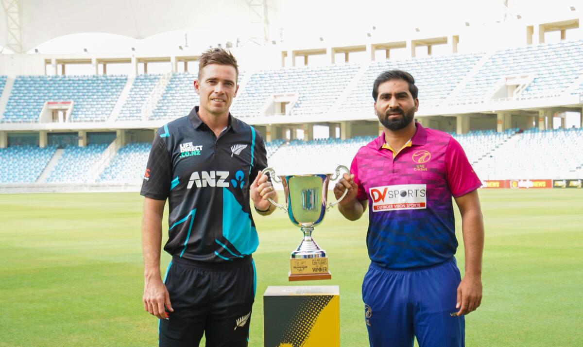 Muhammad Waseem (right) with New Zealand captain Tim Southee during the trophy unveiling ceremony at the Dubai International Stadium. — Supplied photo