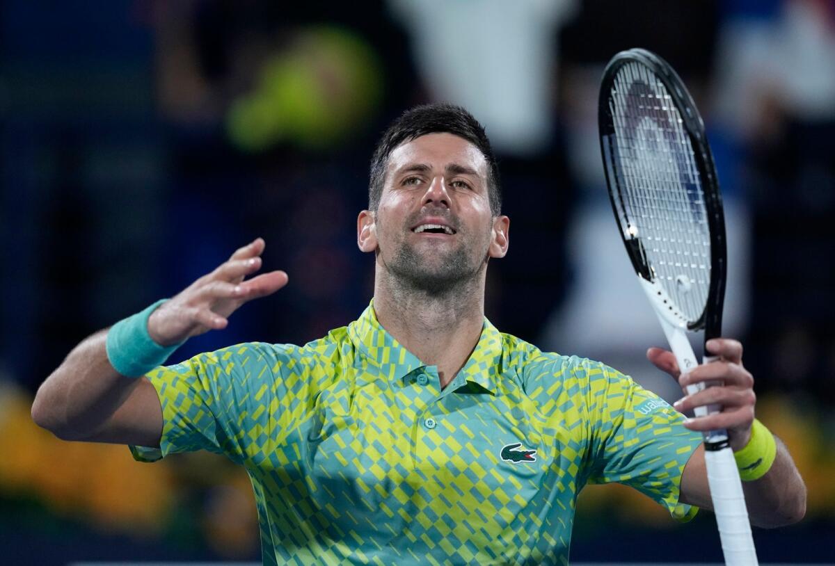 Serbia's Novak Djokovic celebrates after he beats Poland's Hubert Hurkacz during their quarterfinal match in Dubai. — AP