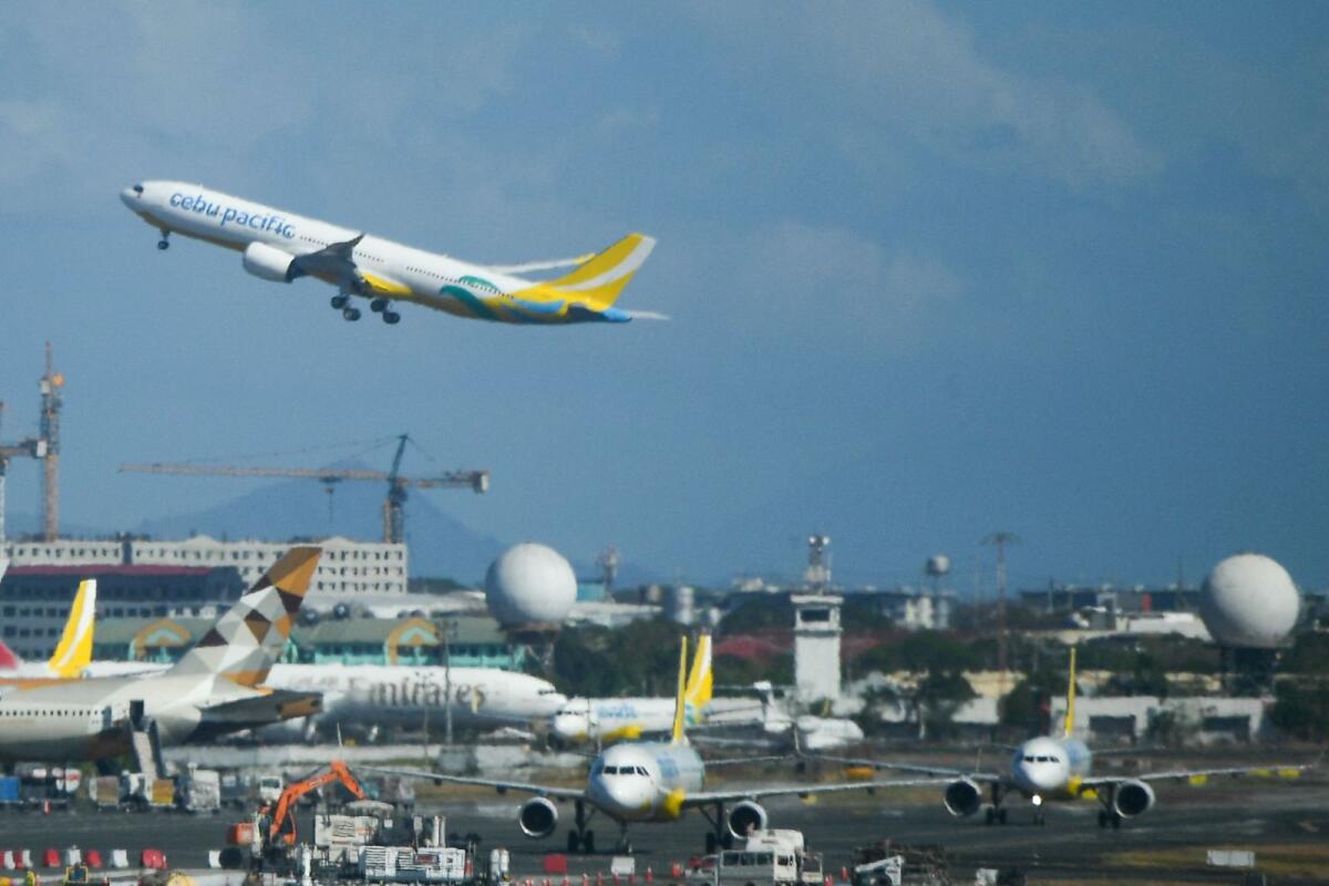 A Cebu Pacific Air passenger plane takes off from the Ninoy Aquino International Airport in Manila on April 3, 2024. — AFP
