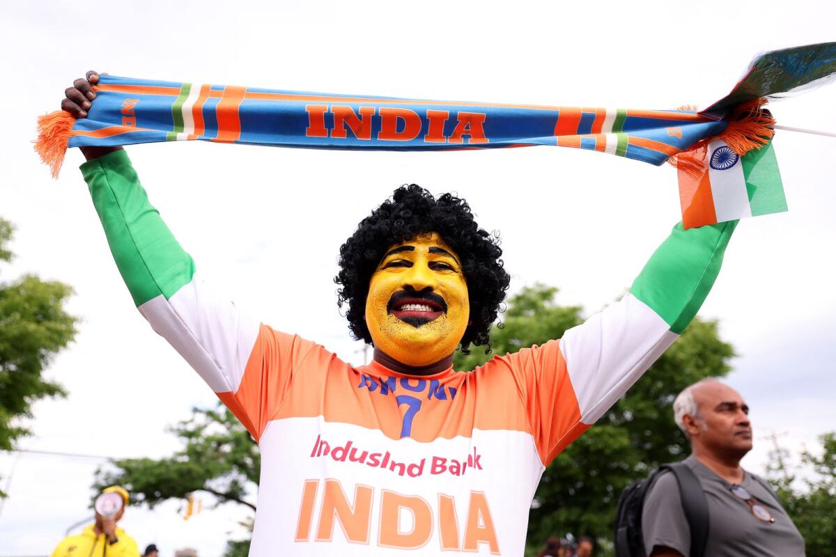 A Indian fan poses for a photo at the 2024 T20 World Cup. — AFP