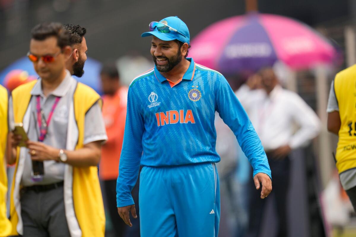India's captain Rohit Sharma leaves the ground after wining the toss during the ICC Men's Cricket World Cup match between India and Pakistan in Ahmedabad, India, Saturday, Oct. 14, 2023. Photo: AP