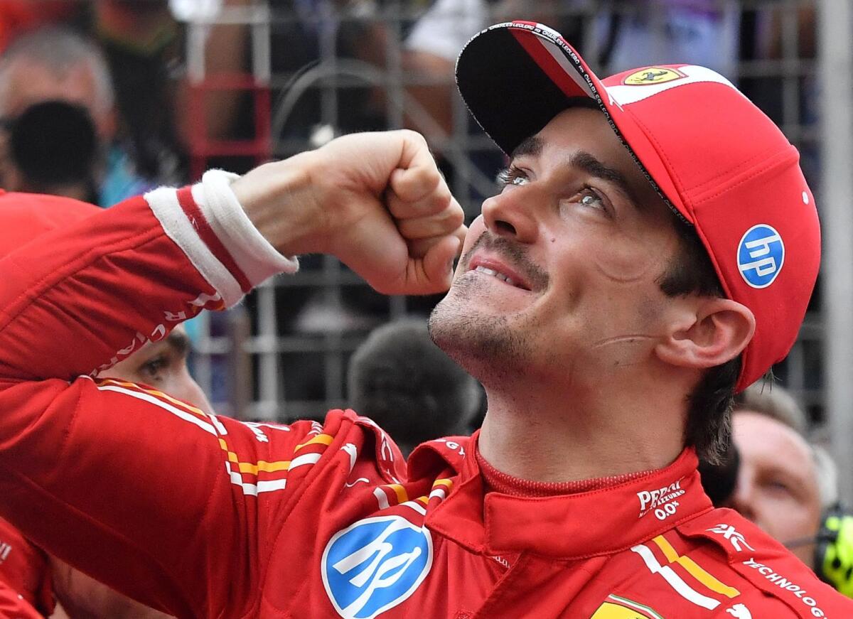 Ferrari's Charles Leclerc celebrates after winning the Monaco Grand Prix. — Reuters
