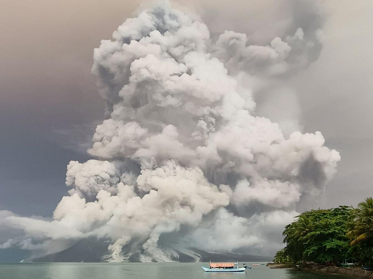 An eruption from Mount Ruang volcano is seen from Tagulandang island in Sitaro, North Sulawesi, on Tuesday. — AFP