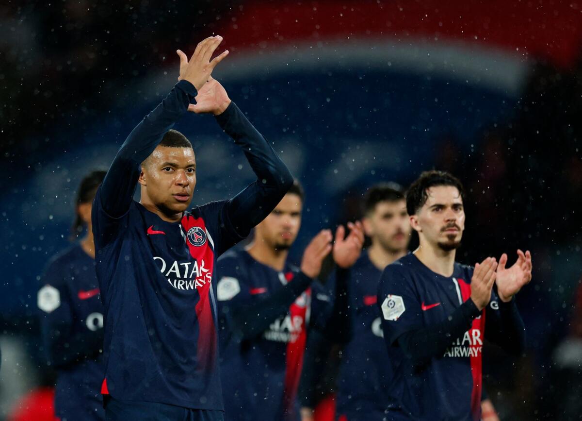 Paris St Germain's Kylian Mbappe applauds fans. — Reuters