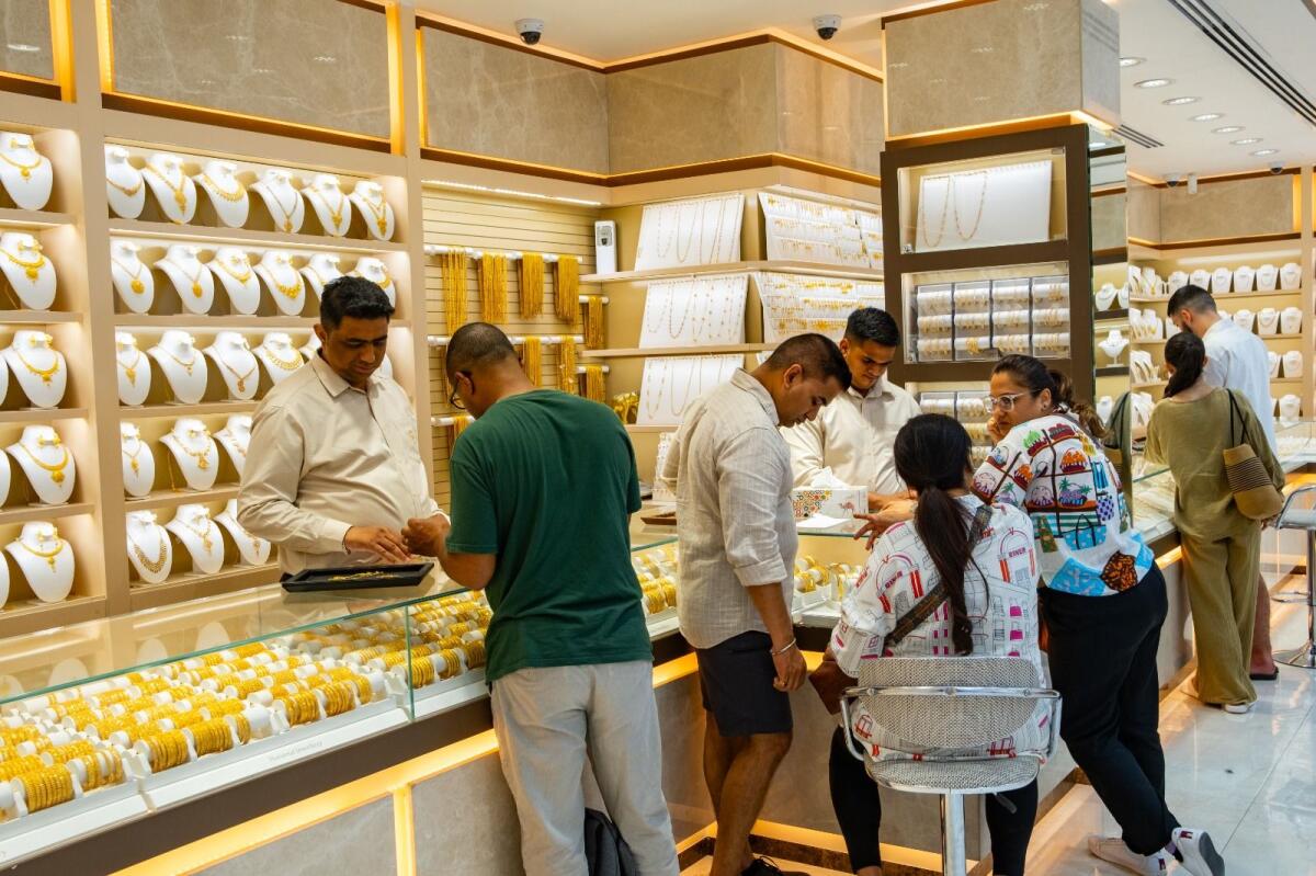 Shoppers at a jewellery shop in Deira Gold Souq. May 3 2024. KT Photo: Shihab