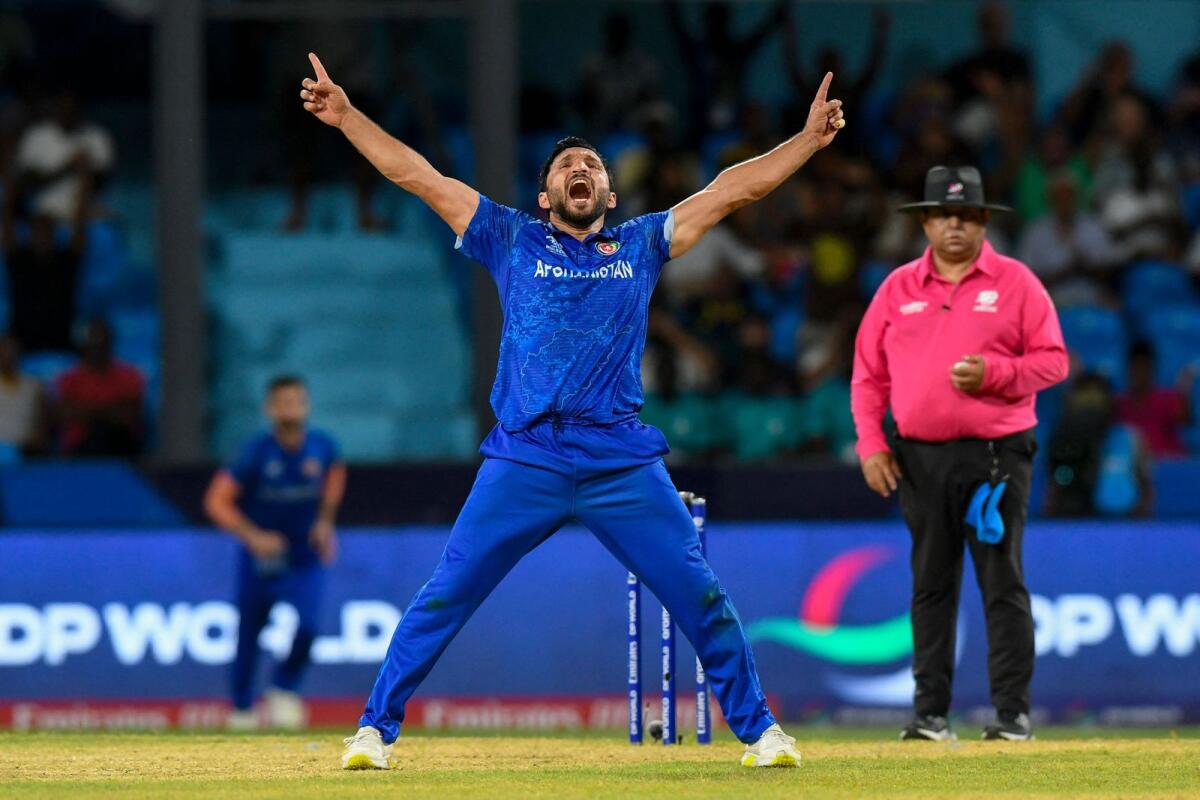 Afghanistan's Gulbadin Naib celebrates after the dismissal of  Australia's Glenn Maxwell during the ICC men's Twenty20 World Cup 2024 Super Eight cricket match. Photo: AFP