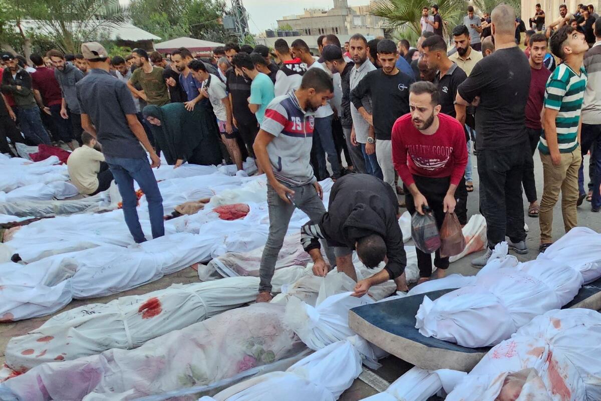 Bodies of Palestinians killed in Israeli strikes on houses in Jabalia refugee camp, lie at a hospital in the northern Gaza Strip, October 31, 2023. Photo: Reuters
