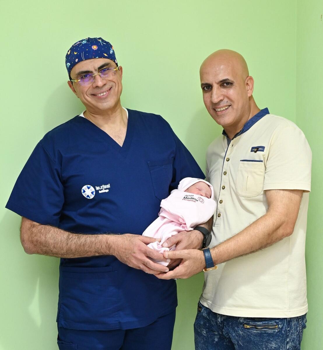 Baby Lydia with Dr Prof. Walid El Sherbiny and her father, Mohamed Abdel-aal Elsayed, at Medeor Hospital, Abu Dhabi