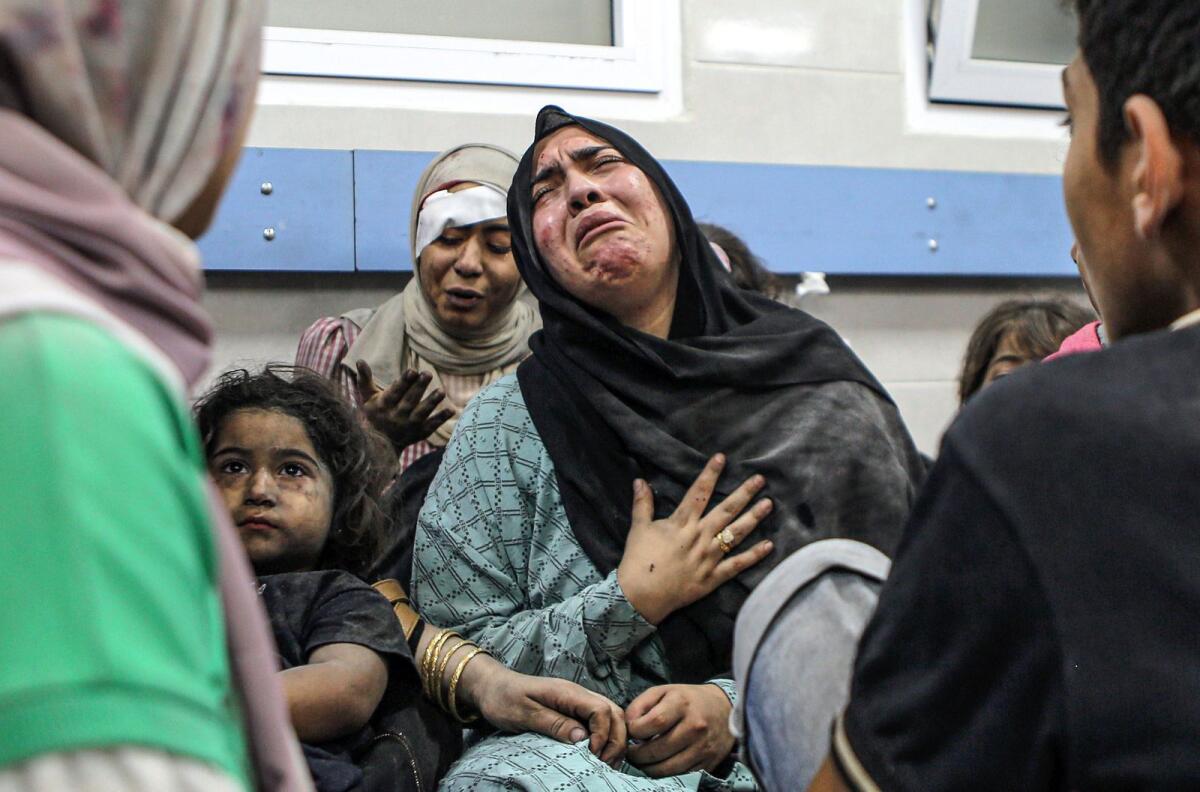 Wounded Palestinians at the al-Shifa hospital, following Israeli airstrikes, in Gaza City, central Gaza Strip, Tuesday, Oct. 17, 2023. Photo: AP