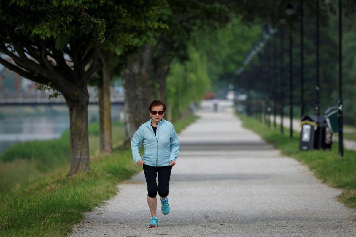 Italian master runner Emma Maria Mazzenga, 90, trains at a park in Padua, Italy, on May 6, 2024. — Reuters