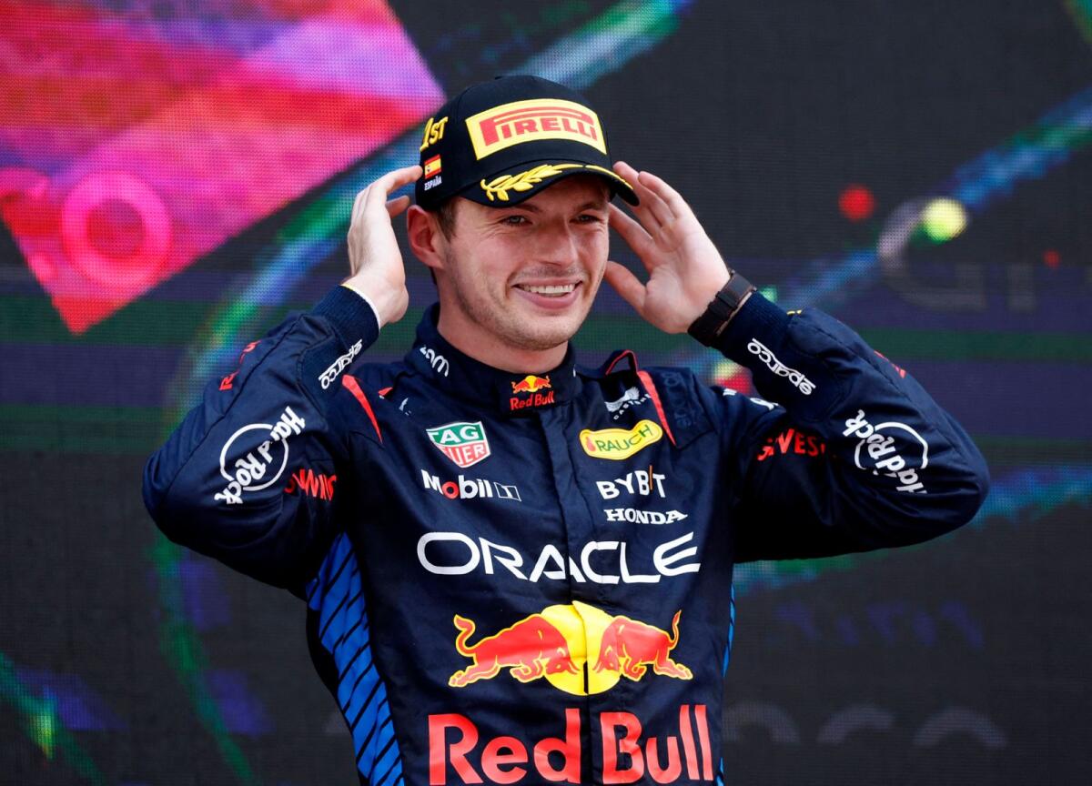 Red Bull's Max Verstappen celebrates on the podium after winning the Spanish Grand Prix. — Reuters