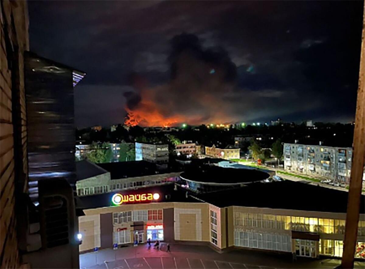 This image made from a social media and and provided by Ostorozhno Novosti shows smoke billowing over the city and a large blaze in Pskov, Russia, on August 29, 2023. — AP