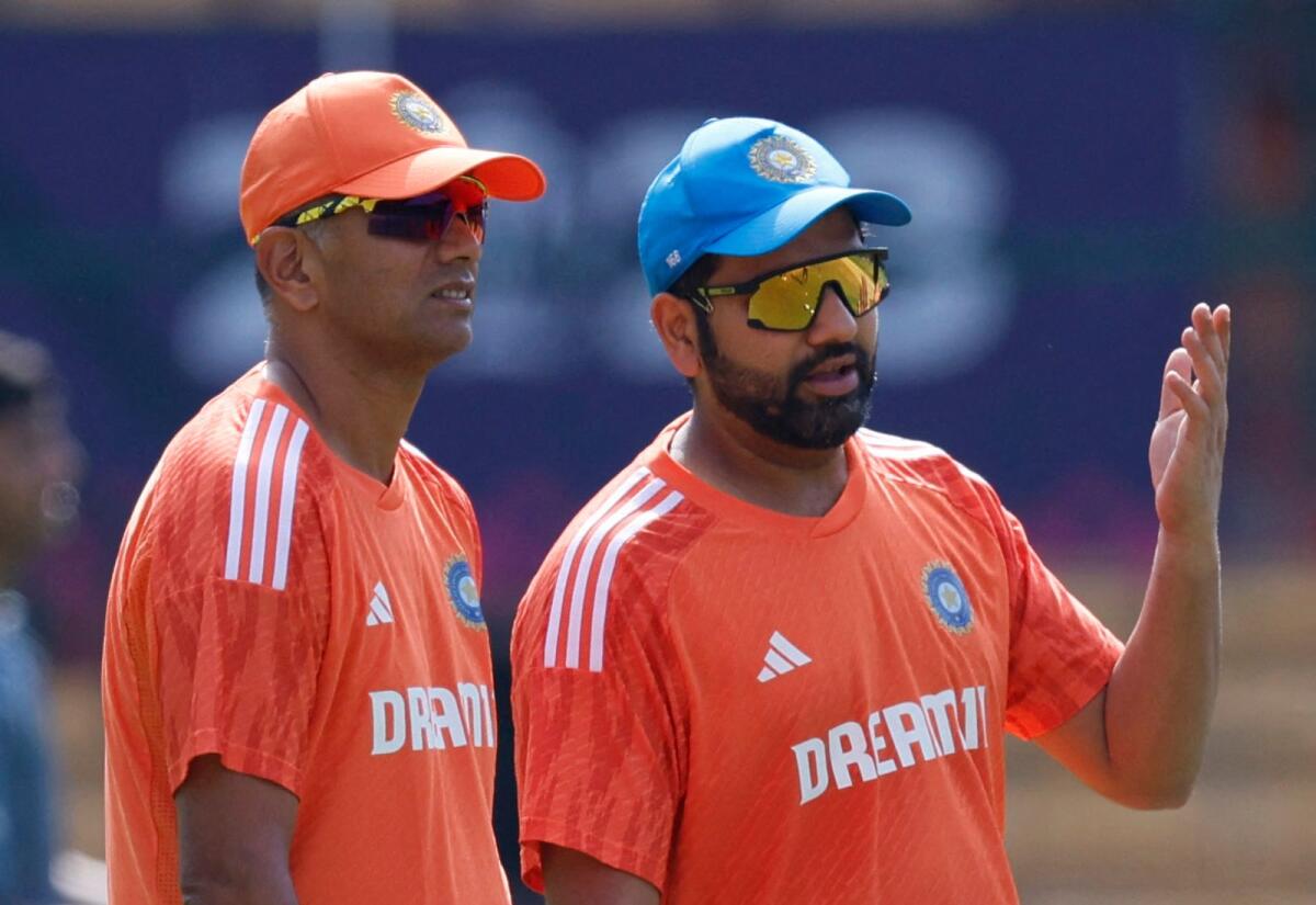 India's Rohit Sharma with coach Rahul Dravid during practice. Photo: Reuters