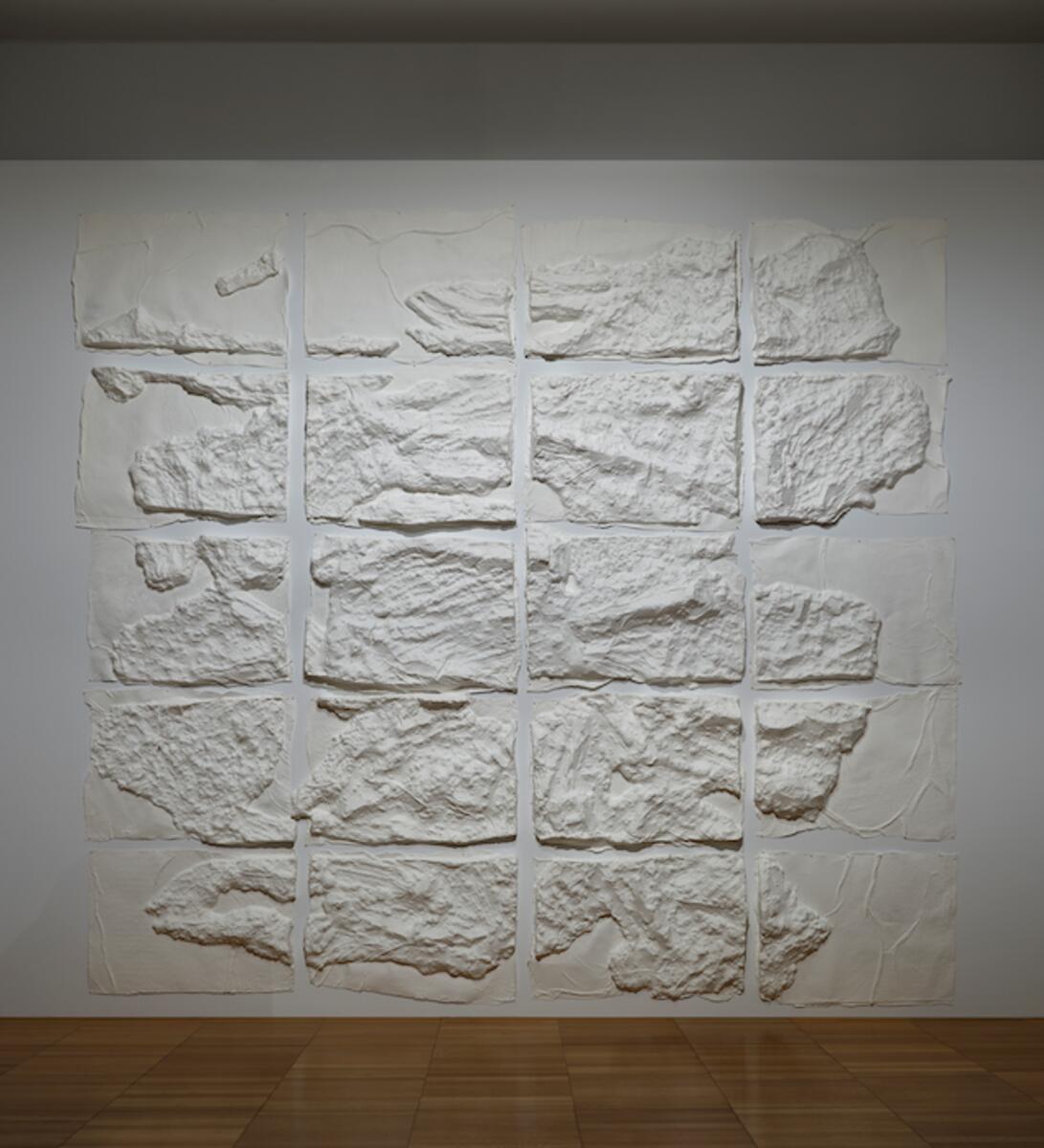 Installation view of Blane De St. Croix: Horizon at The NYUAD Art Gallery, 2023. Over Ice, Svalbard, 2020 Cast white cotton paper, 381 × 411 x 15 cm