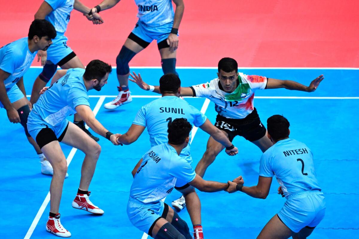 Indian and Iran in action during the gold medal match at Hangzhou. - AFP