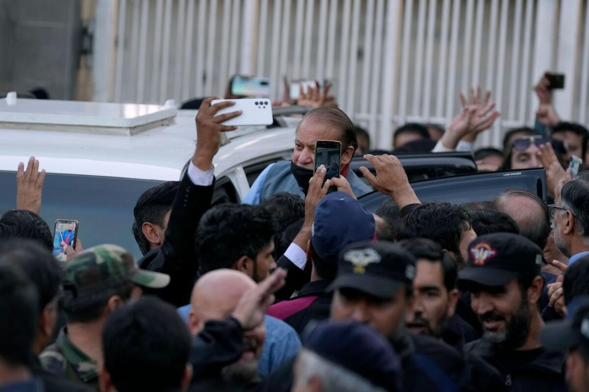 Pakistan's former prime minister Nawaz Sharif boards in a vehicle after appearing in a court in Islamabad, Pakistan, on Thursday. – AP