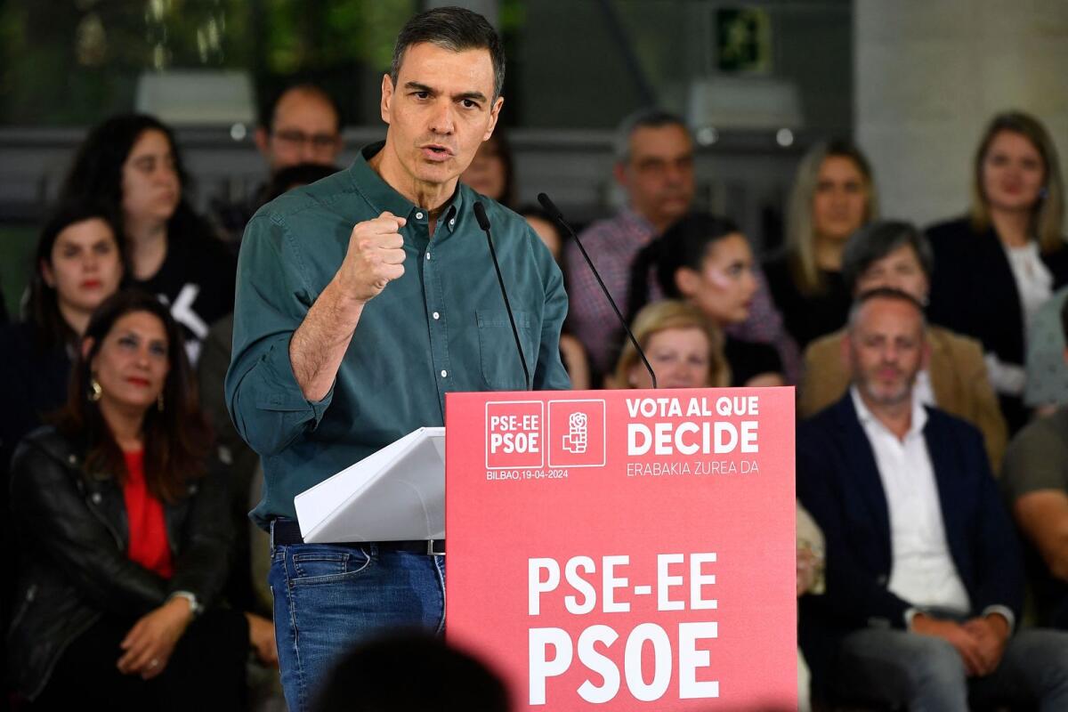 Spanish Prime Minister Pedro Sanchez gestures as he delivers a speech during the Basque Socialist Party (PSE) closing campaign meeting in Bilbao on April 19, 2024 ahead of regional elections in the Basque Country.  — AFP