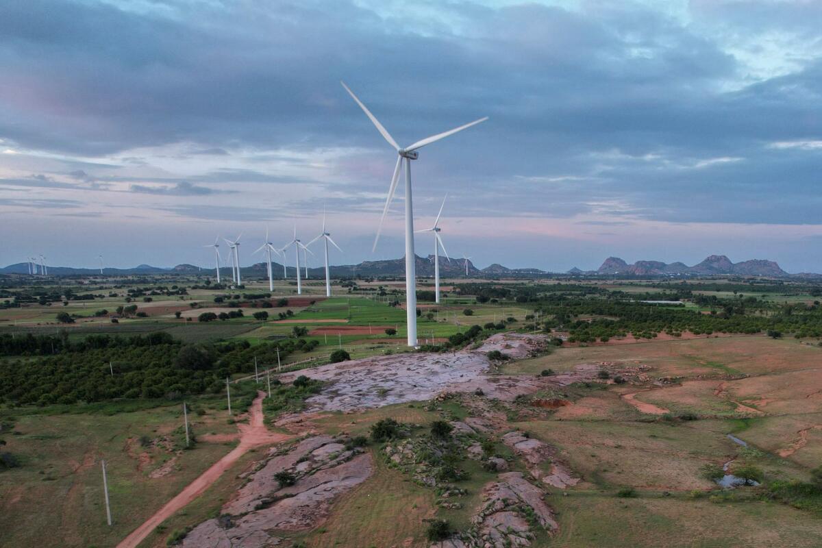 A windmill farm works in Anantapur district, Andhra Pradesh, India, on September 14, 2022.  India’s renewables sector is booming, with the country projected to add 35 to 40 gigawatts of renewable energy annually until 2030, enough to power up to 30 million more homes each year. Photo: AP