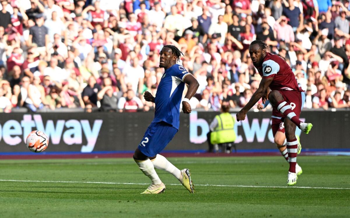 West Ham United's Michail Antonio scores their second goal against Chelsea on Sunday. - Reuters