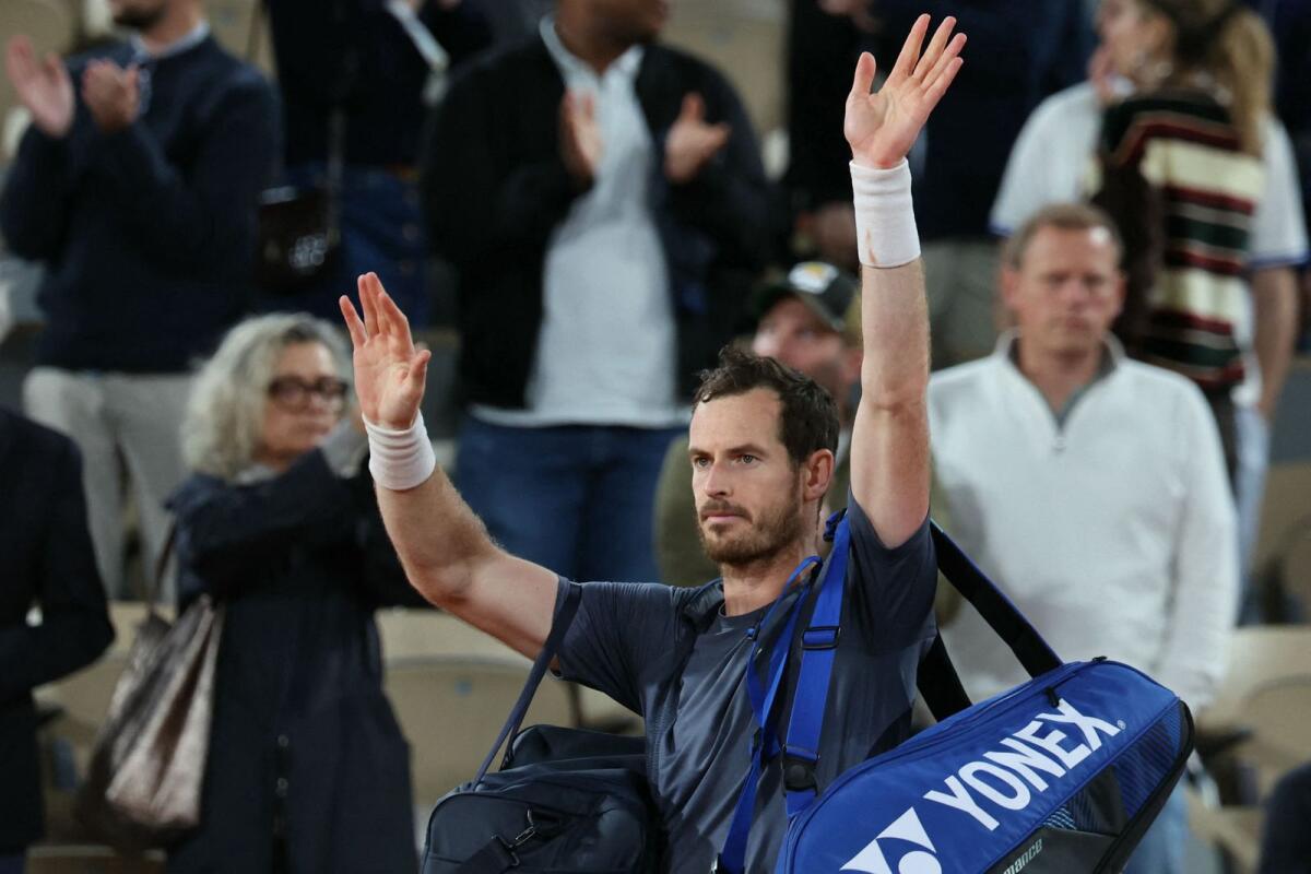 Britain's Andy Murray acknowledges the crowd after losing against Switzerland's Stan Wawrinka. — AFP