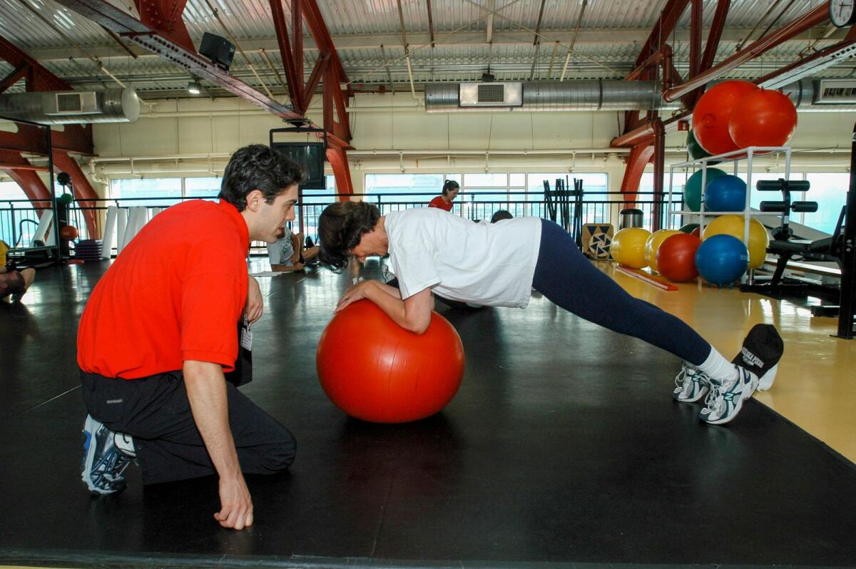 Trish Talerico workout with the trainer Jarrod Jordan at Chelsea Piers in New York on May 20, 2004.  — Frances Roberts/The New York Times