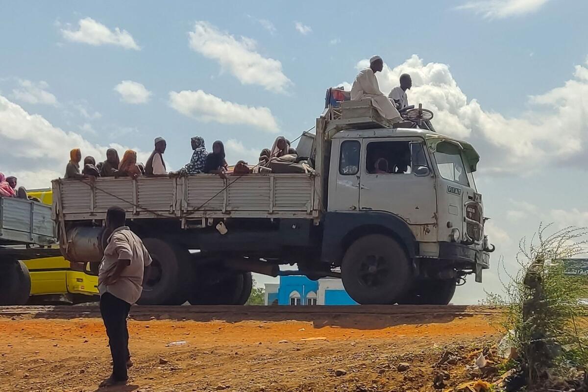 People fleeing the town of Singa, the capital of Sudan's southeastern Sennar state, arrive in Gedaref in the east of the war-torn country on July 2, 2024. — AFP