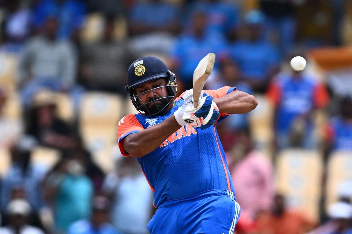 India's captain Rohit Sharma plays a shot during the match against Australia. — AFP