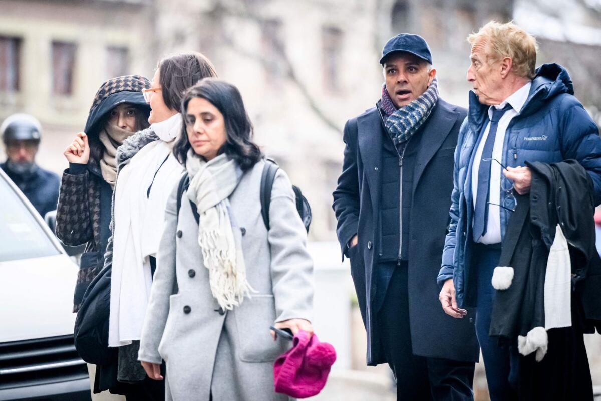 Indian-Swiss billionaire family members Namrata Hinduja (L) and Ajay Hinduja (2ndR) arrive at the Geneva’s courthouse with their lawyers at the opening day of their trial for human trafficking on January 15, 2024. Photo: AFP