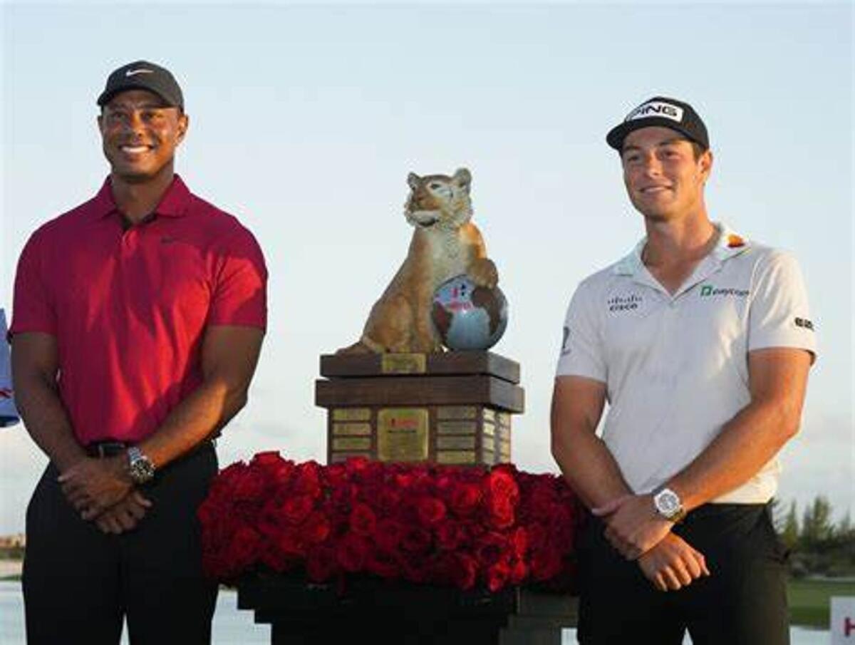 Tiger Woods, wjo returns to tournament golf at this week's HERO Golf Challenge, pictured with 2021 and 2022 champion, Viktor Hovland. - Supplied photo
