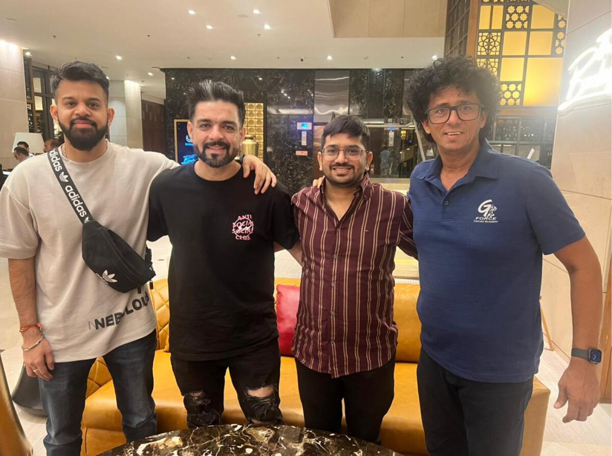 Dubai RJ Parikshit Balochi (second left) with Dubai-based cricket coach Gopal Jasapara (right) in Ahmedabad ahead of the World Cup final. — Supplied photo