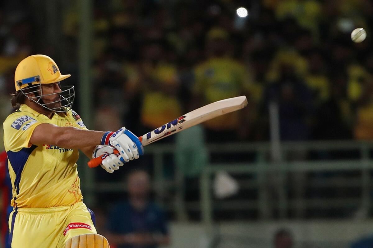 Chennai Super Kings' MS Dhoni plays a shot. — AP
