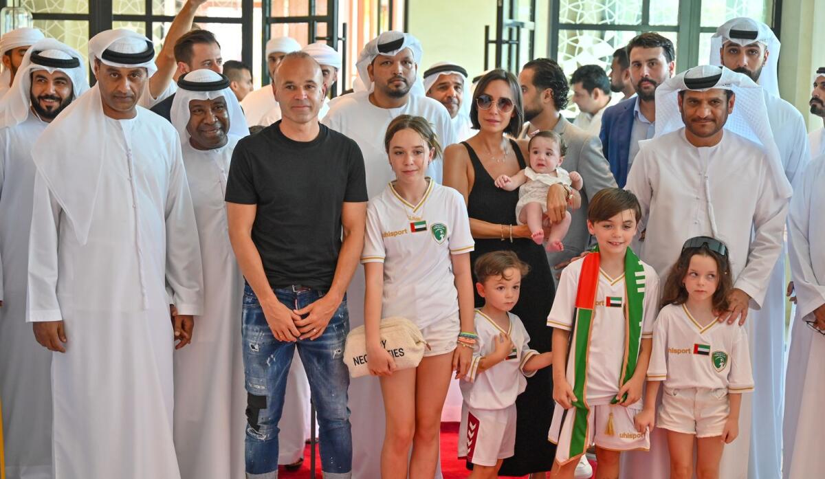 Andres Iniesta with his family and Emirates Club officials. — Photo by M. Sajjad