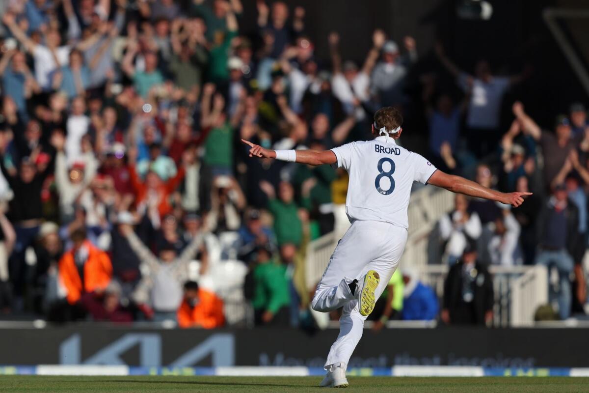 England's Stuart Broad celebrates after taking the final wicket in the fifth Ashes Test. — AFP