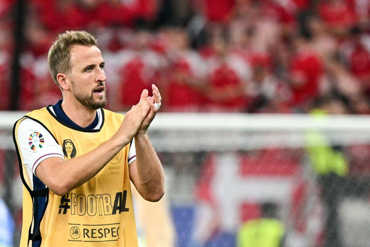 England forward Harry Kane acknowledges the crowd after the match. — AFP