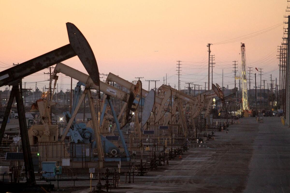 Oil pumpjacks at the Wilmington Field oil deposits near Long Beach, California. — Reuters file