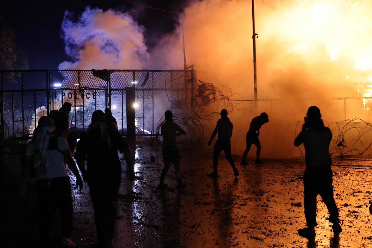 Protesters clash with Lebanese security forces on October 18, 2023, outside the US Embassy. Photo: AFP