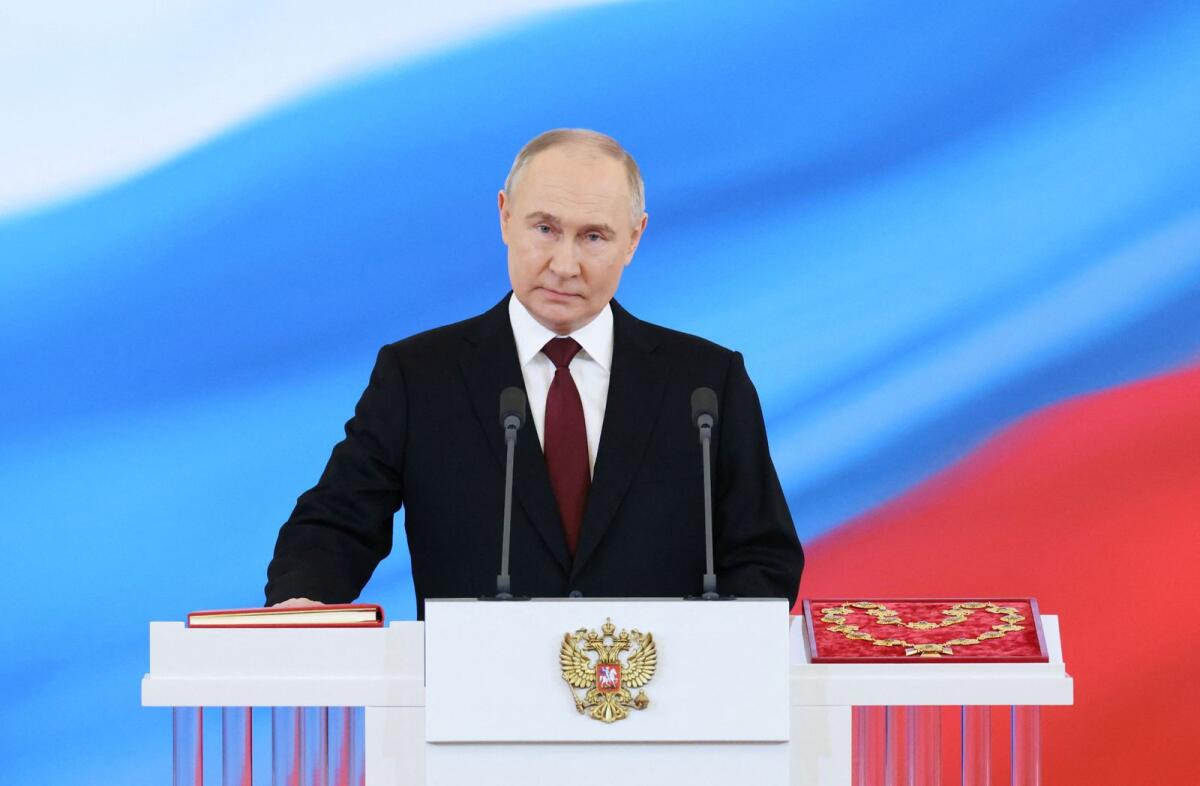 Russian President Vladimir Putin takes the oath of office during his inauguration ceremony at the Kremlin in Moscow on Tuesday. — Reuters