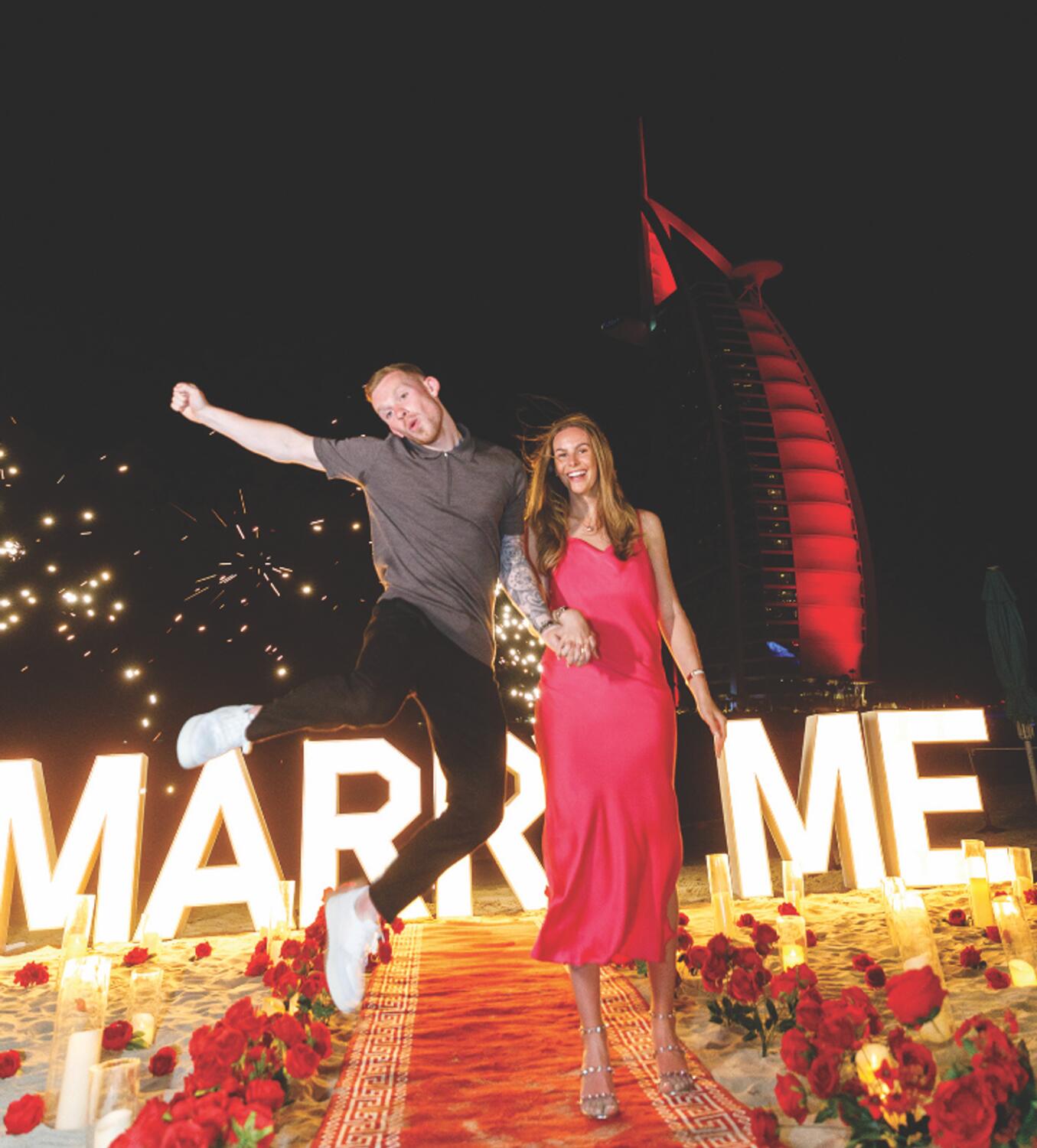 English footballer Lewis O’Brien’s lavish proposal to his partner Robyn Hartley on a private Dubai beach