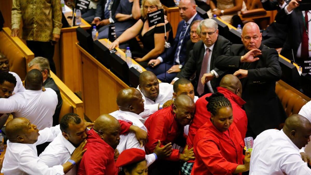 Watch: Fistfight in South African parliament as guards eject MPs