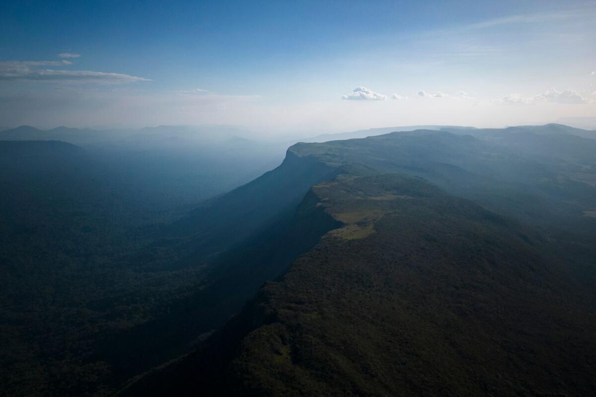Clouds hover over the Woipan Tepuy on Pemon Indigenous territory at the Gran Sabana, Bolivar state, Venezuela, on April 5, 2023. — AP