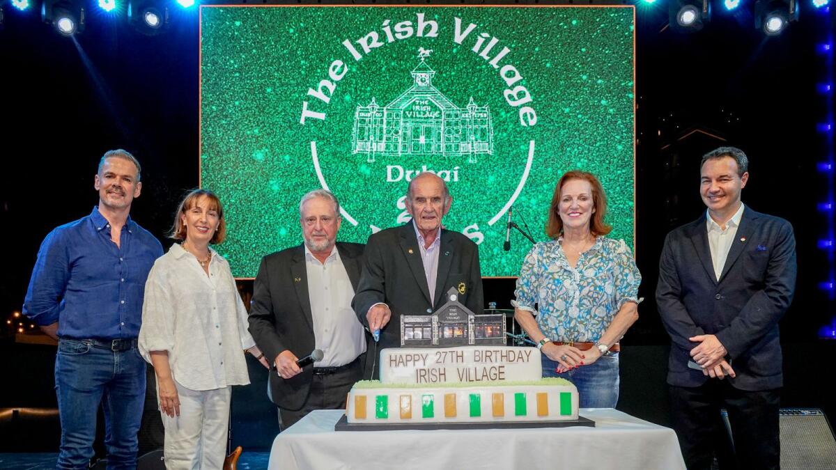Colm McLoughlin, Dr Bernard Creed, Sinead El Sibai, Michael Schmidt, Sharon Beecham and Dave Cattanach, General Manager, The Irish Village Complex, at the celebratory cutting of the 27th anniversary cake of The Irish Village.