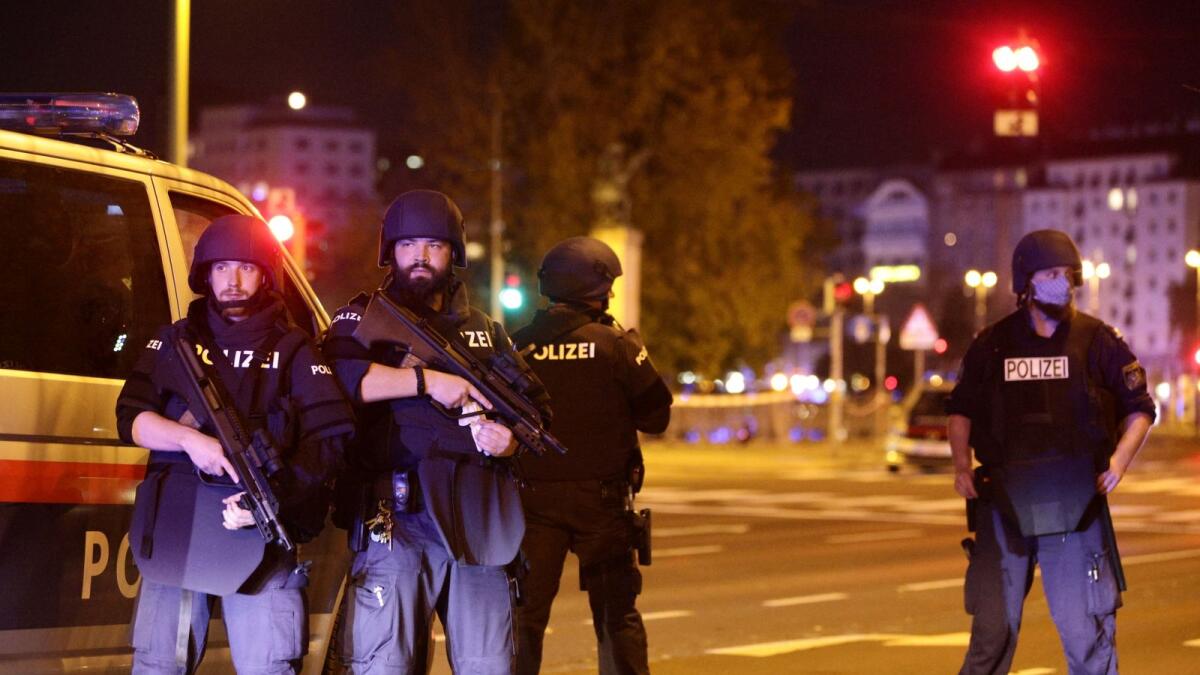 Police block a street near Schwedenplatz square after exchanges of gunfire in Vienna, Austria November 2, 2020. Reuters