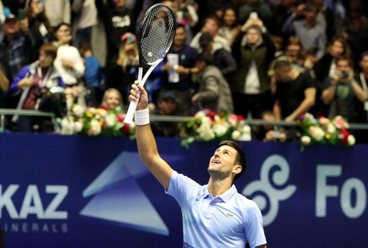 Serbia's Novak Djokovic celebrates winning the final against Greece's Stefanos Tsitsipas. (Reuters)