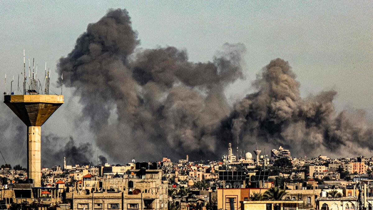 Smoke billows from Israeli bombardment over Khan Yunis on Saturday. Photo: AFP